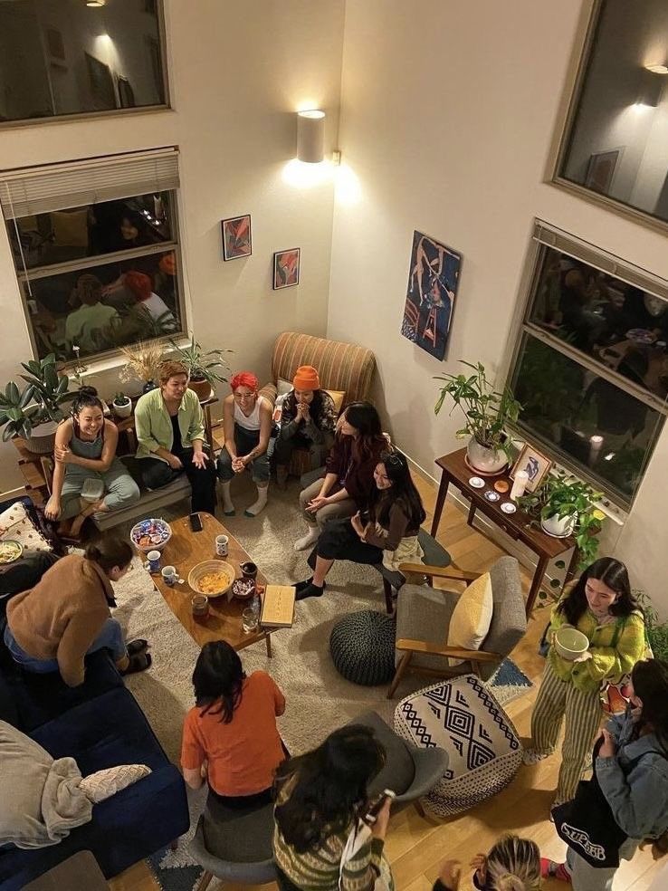Group of people hanging out in a cozy living room
